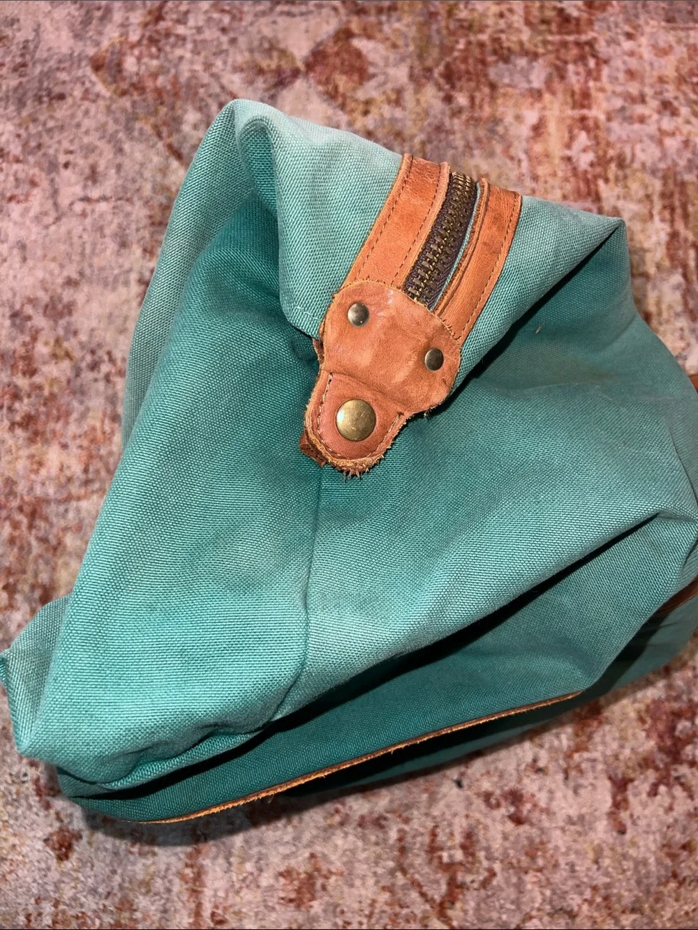 Vintage green duffle bag with leather handles